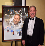 National Space Trophy recipient, Dr. John Grunsfeld, with his portrait