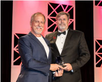Marc Havican (left) receiving the Space Communicator Award, presented by Jeff Carr (right)